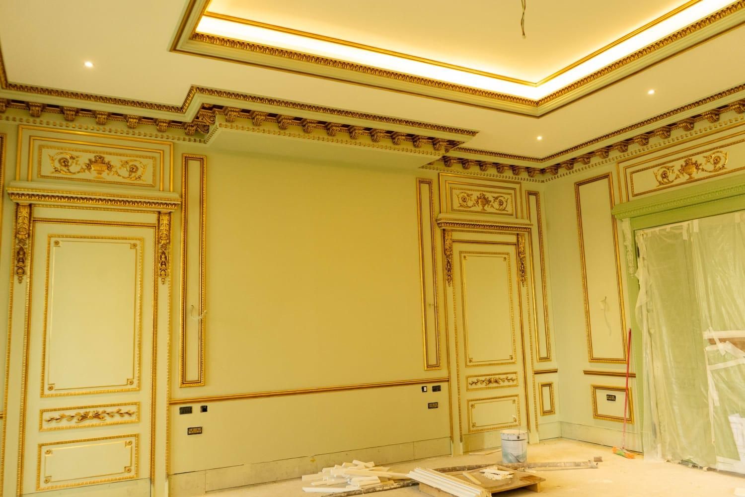 Gold leaf gilded wall panelling and cornice detail
